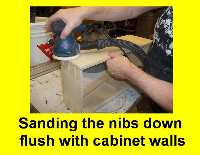 May be an image of text that says 'BOSCH CANAO Sanding the nibs down flush with cabinet walls'